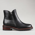 Load image into Gallery viewer, Black Le Sansa Cayla boots shown from the side, featuring sleek design and ankle-high style.