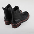 Load image into Gallery viewer, Le Sansa Costa black boots showing the back view with sleek design and sturdy heel.