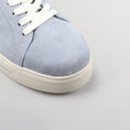 Load image into Gallery viewer, Close-up of Naked Arches Azealia denim sneakers showing blue denim material and stylish design details.
