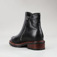 Load image into Gallery viewer, Black LE SANSA CAYLA boots by Le Sansa with sleek design and pointed toes, displayed on a neutral background.

