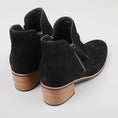 Load image into Gallery viewer, NAKED ARCHES Oxley black suede boots showing the side view with a sleek silhouette and stylish design.
