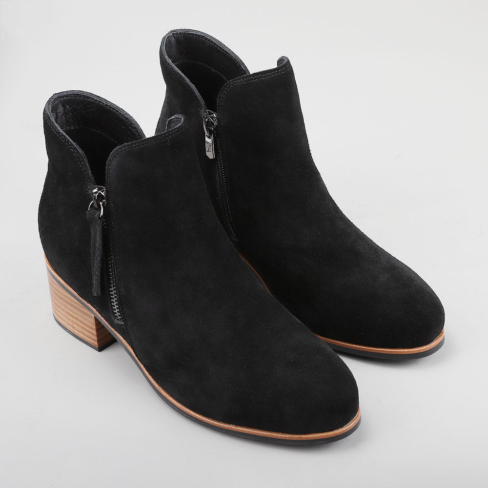 Naked Arches Oxley black suede boots with ankle height and sleek design, featuring a rounded toe and subtle heel.