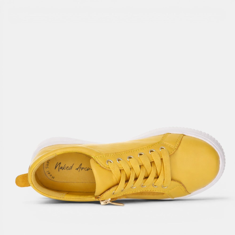 NAKED ARCHES NELLY MUSTARD